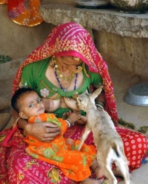 indian women breastfeeding deer